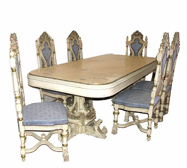 An Italian Rococo style paint decorated nine piece dining set