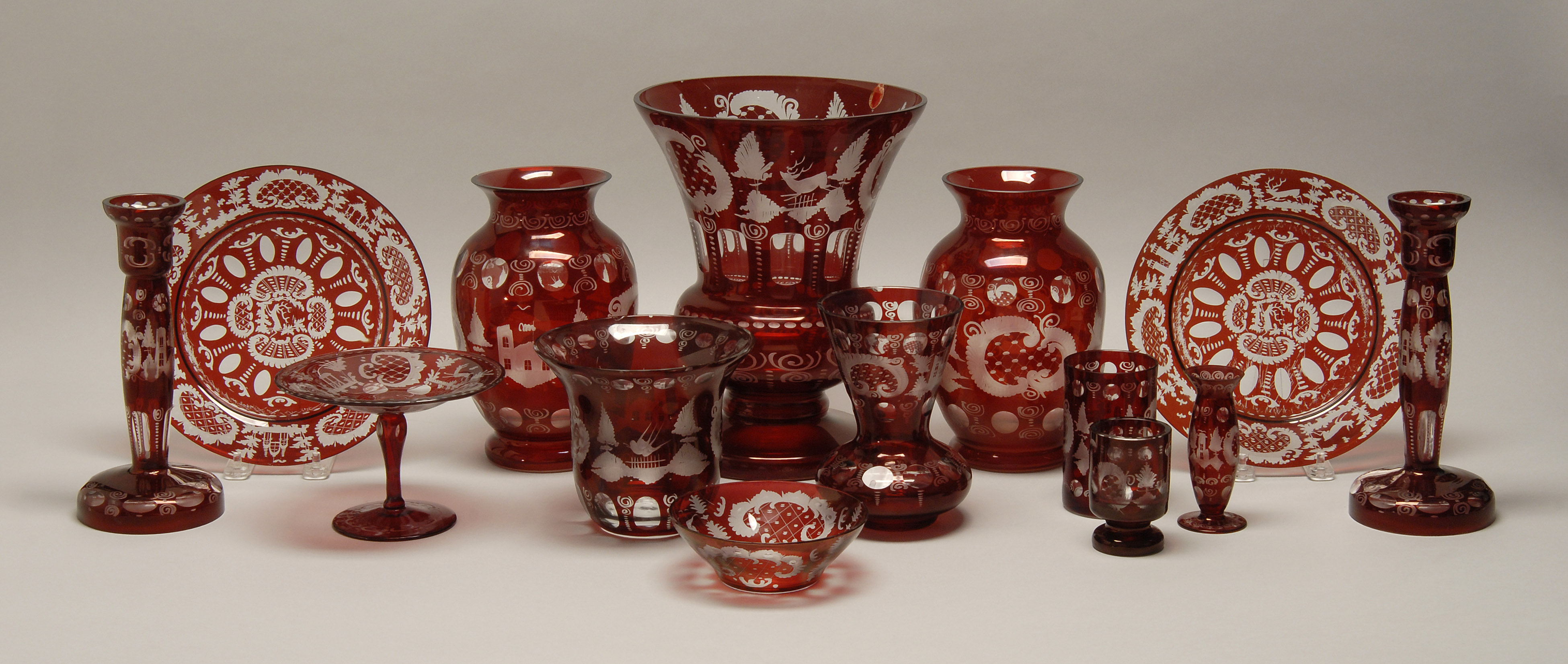 FOURTEEN PIECES OF BOHEMIAN RUBY CUT TO CLEAR GLASS Late