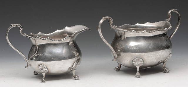 A SILVER MILK JUG and sugar bowl of baluster form
