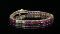 A Ruby Diamond Tennis Bracelet 14K yellow gold bracelet with