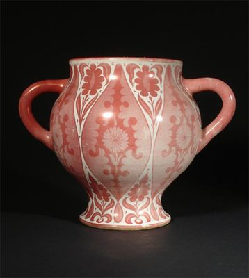 A William De Morgan twin handled vase painted with floral