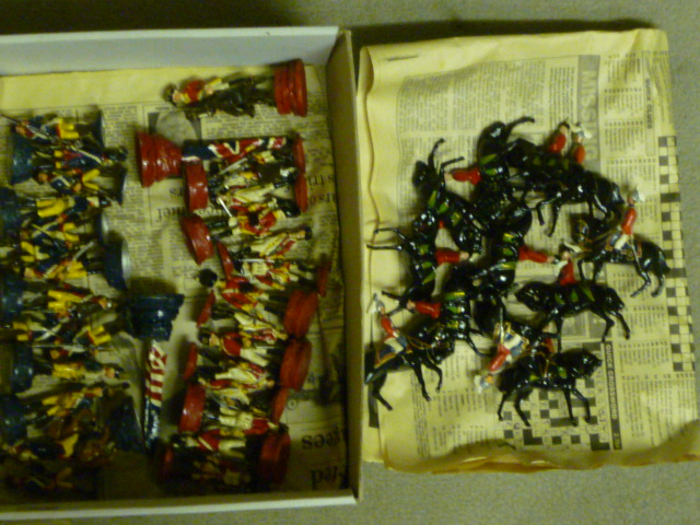 A quantity of lead soldiers comprising eleven Running Highlanders marked