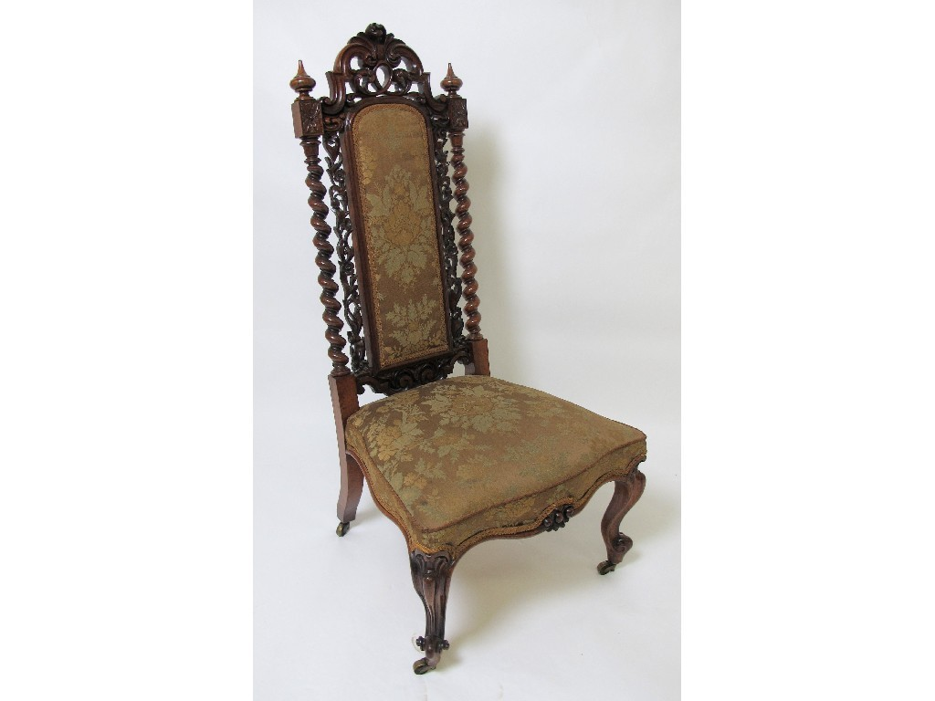 A Victorian rosewood hall chair the shaped top with carved