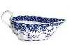 A WORCESTER FLUTED SAUCE BOAT painted in bright underglaze blue
