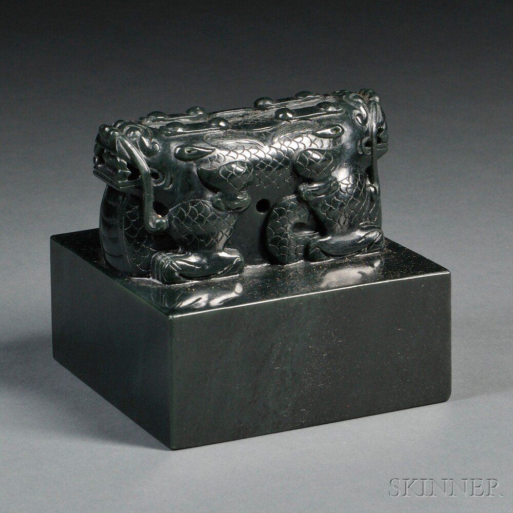 Stone Dragon Seal China square surmounted by a pair of