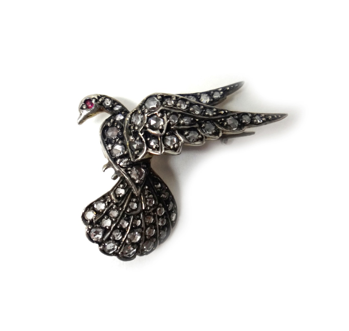 A rose diamond set brooch designed as a bird in
