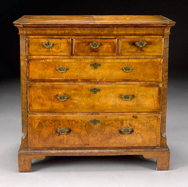 A George II featherbanded walnut chest second quarter 18th century