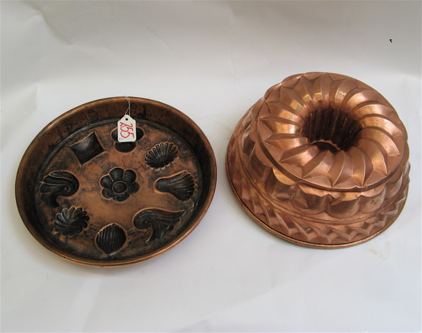 TWO EARLY 19TH CENTURY FRENCH COPPER FOOD MOLDS a shallow