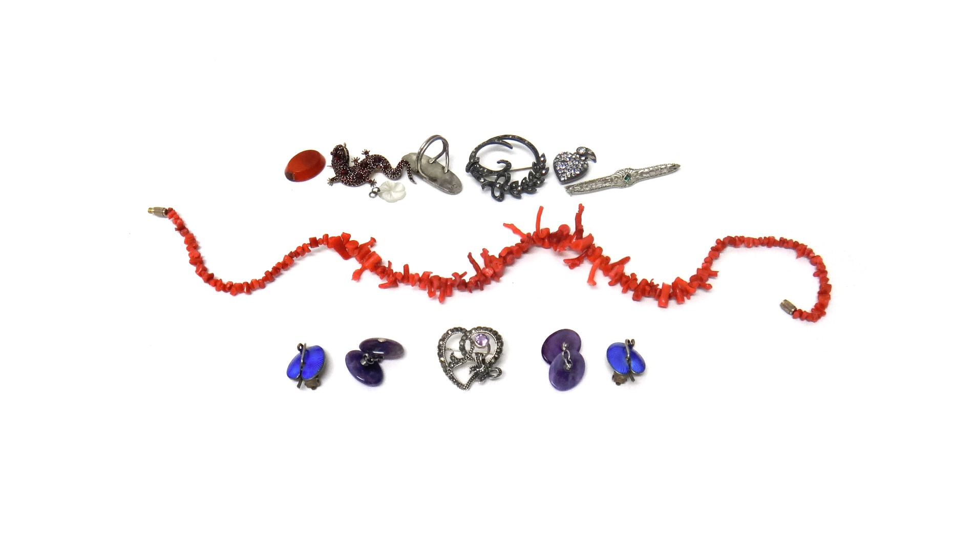 A Bohemian garnet set brooch designed as a lizard a