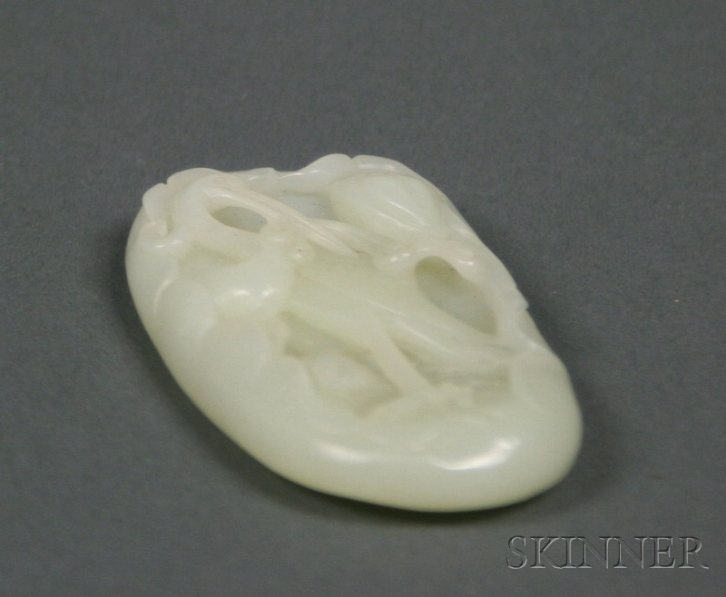 Jade Paperweight stone of a greenish white color carved as