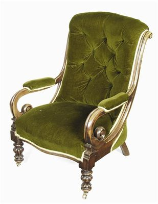 A Victorian mahogany open armchair button upholstered green plush fabric