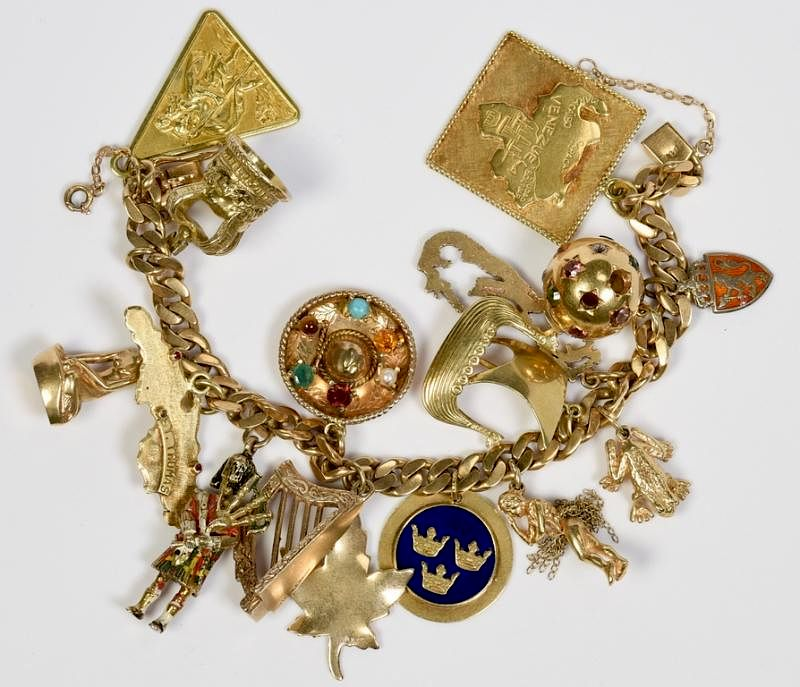 14K Charm Bracelet 88 2 grams 16 charms 14K yellow