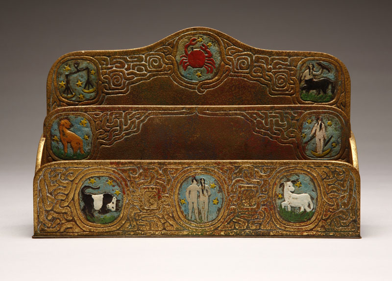 A Tiffany Studios gilt bronze and enameled Zodiac letter rack