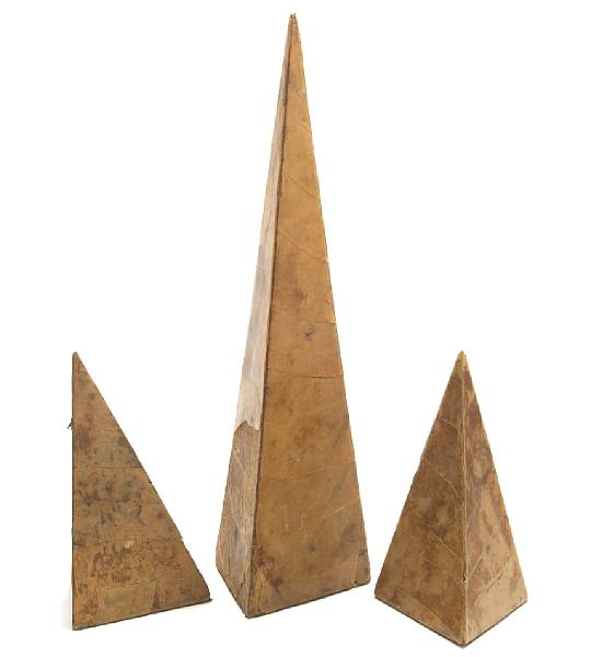 A tortoiseshell veneered obelisk together with a pair of matching