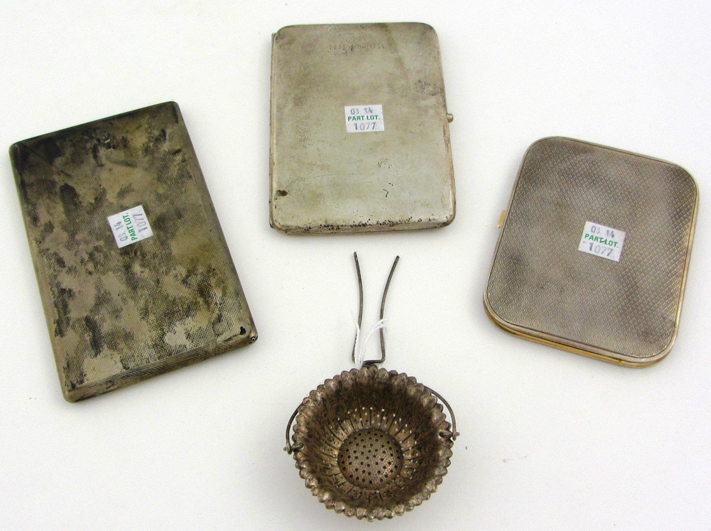 Three silver rectangular cigarette cases combined weight 580 gms and