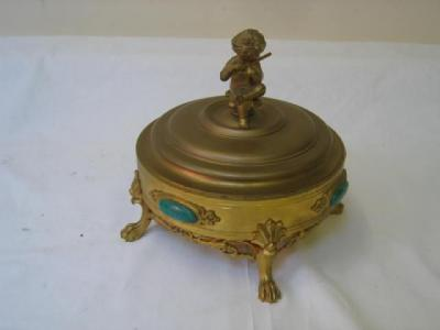 A FRENCH MALACHITE AND GILDED METAL BOX of circular form