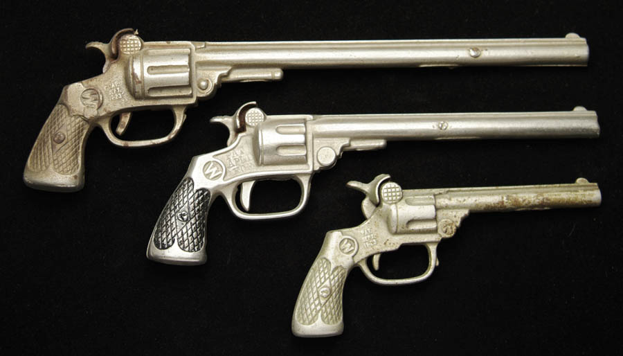 LOT OF THREE CAST IRON CAP GUNS To include a