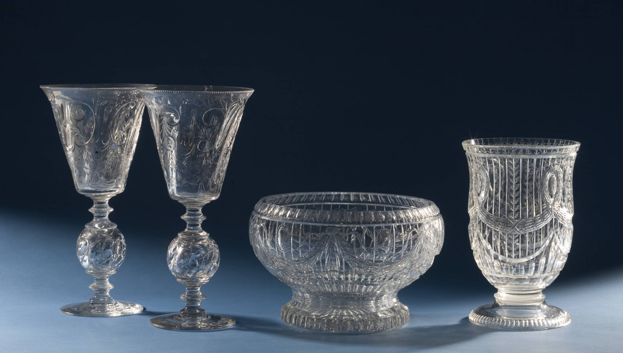 PAIR OF BLOWN AND ENGRAVED MONUMENTAL CEREMONIAL FOOTED GOBLETS A