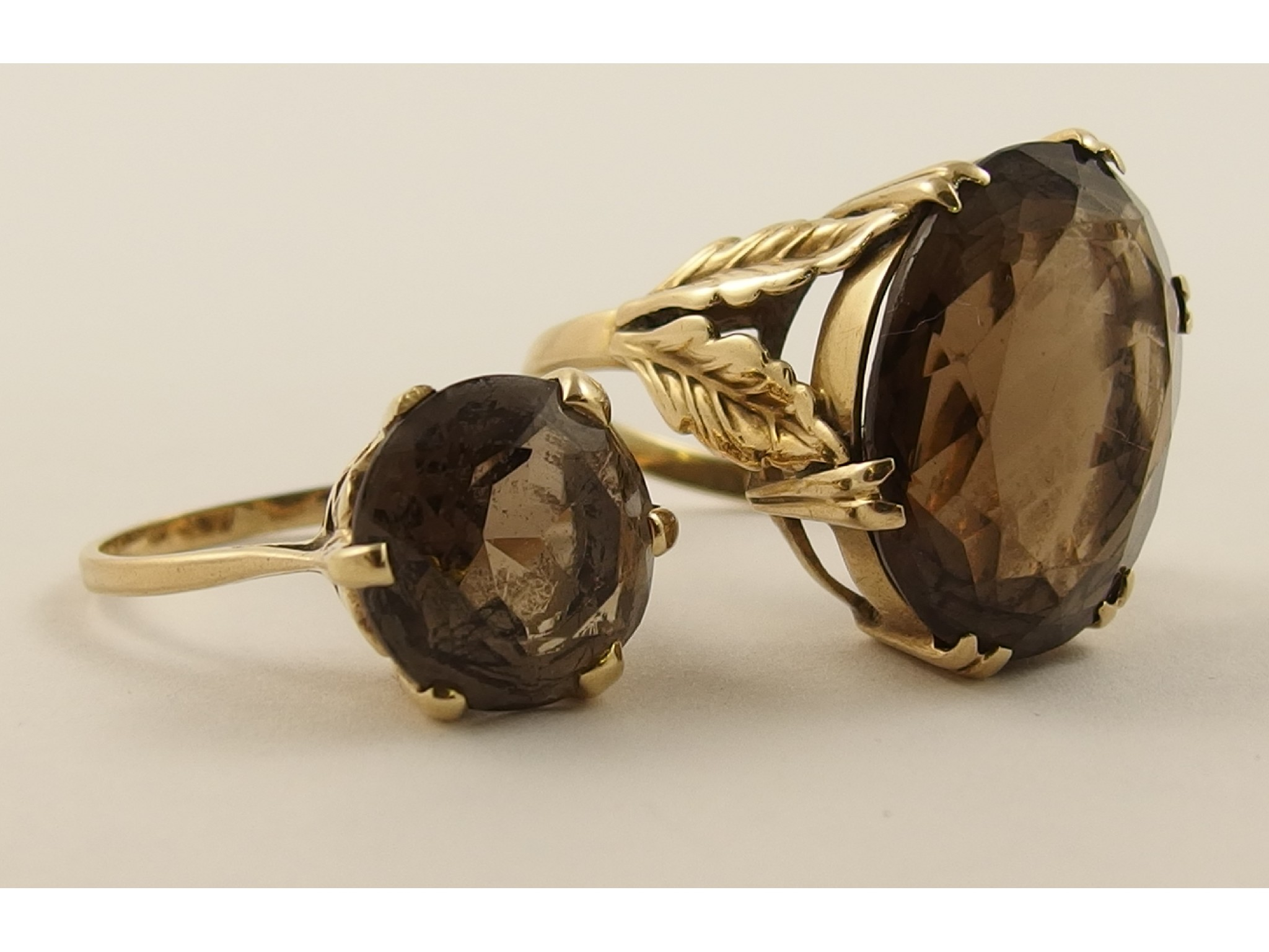 Two 9ct smoky quartz rings
