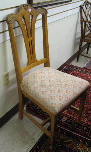A SET OF FOUR OAK DINING CHAIRS English c 1900