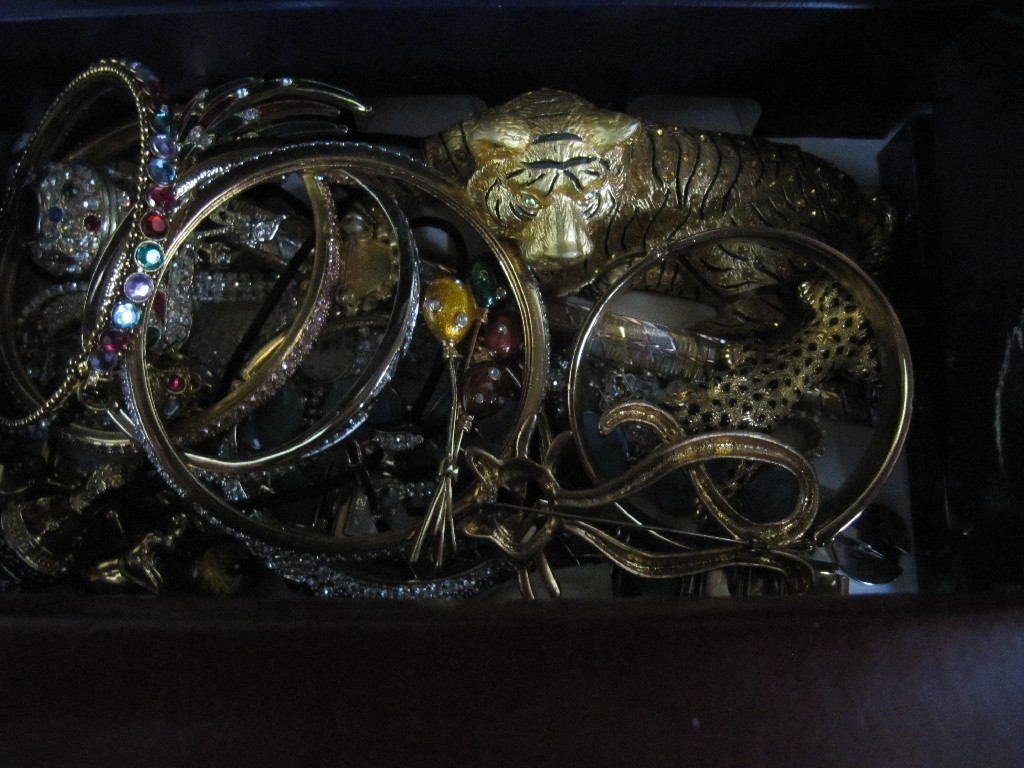 Box of costume jewellery tiger figures etc