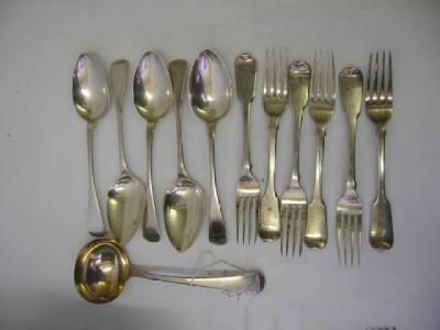 A GEORGE III LADLE with gilded bowl London 1812 six