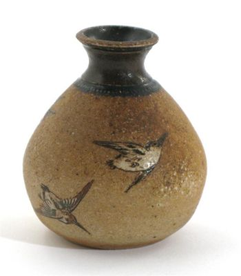 A Martin Brothers stoneware miniature vase ovoid form incised with