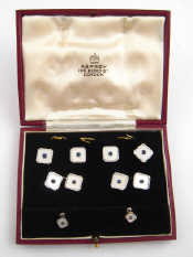 A set of white metal tests 9 carat gold sapphire