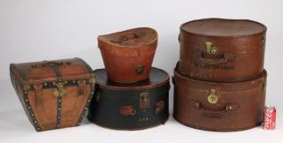 5 Group of five vintage luggage pieces executed in leather