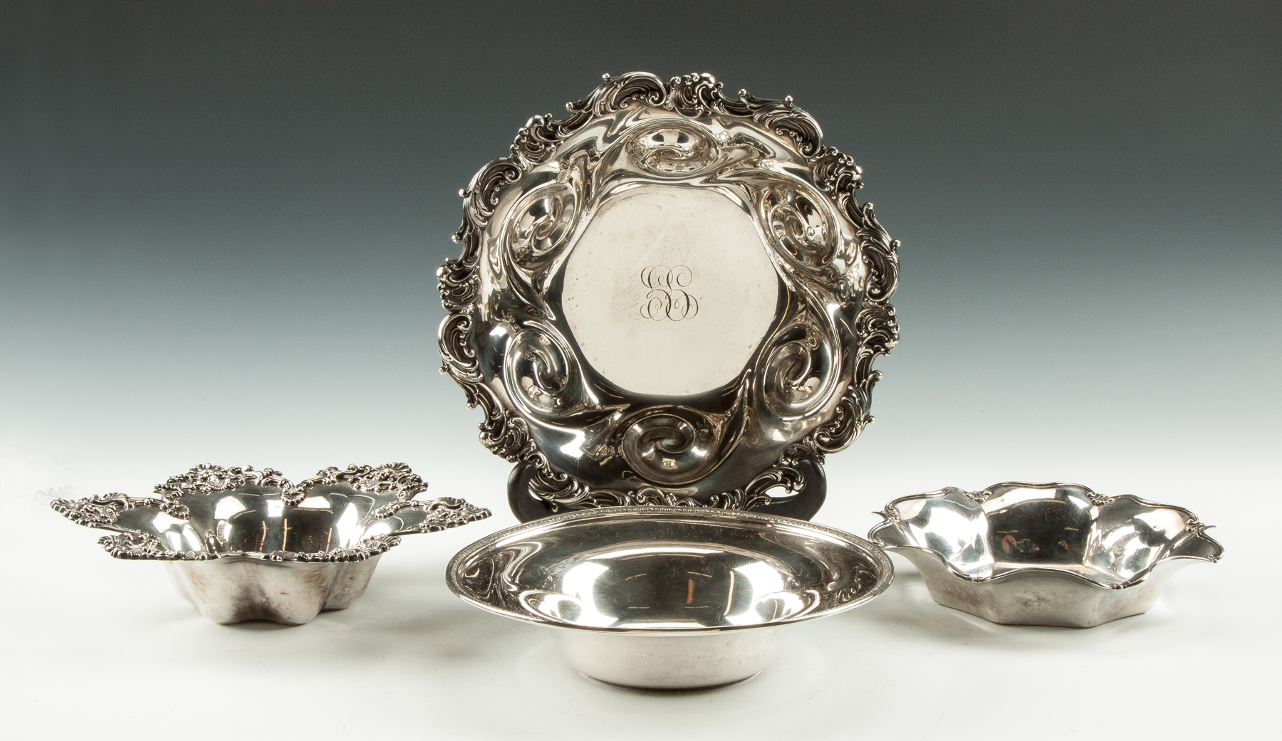 Four Sterling Silver Bowls All monogrammed Clockwise Unknown shell border