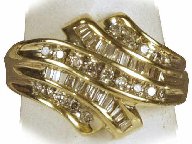 Dazzling ladies 14 karat yellow gold ring channel set with