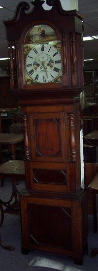 An early 19th Century oak and mahogany longcase clock with