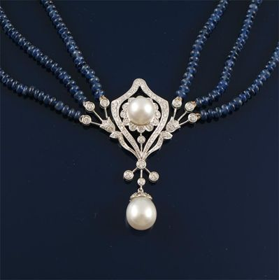 A diamond and cultured pearl set white gold pendant With