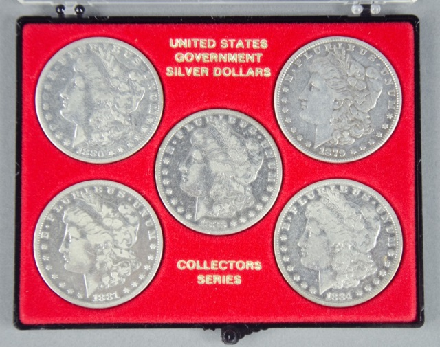 Five Circulated MorgansGrades range VG VF Dates include 1879 1880