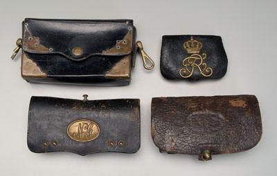 Four leather cartridge boxes one hard leather with brass mounts