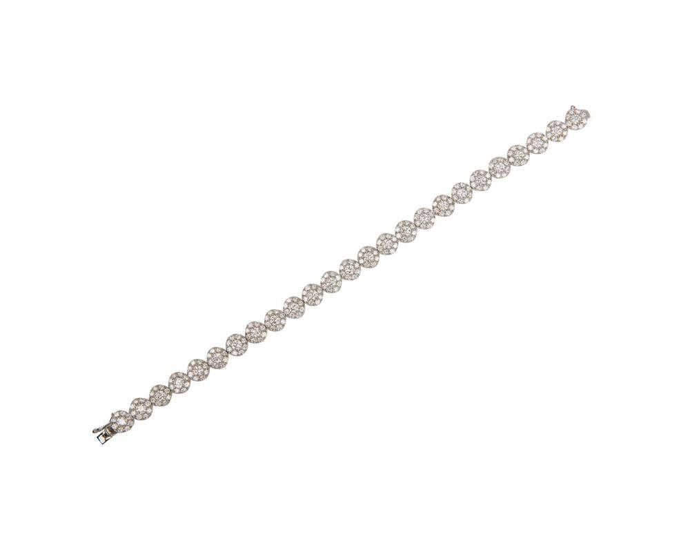 18K Gold and Diamond Bracelet featuring 25 links comprised of
