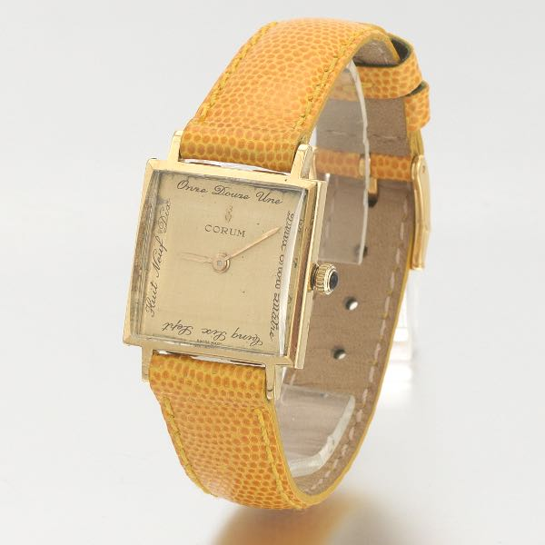 CORUM 18K GOLD SWISS MADE DRESS WATCH WITH GUCCI MADE