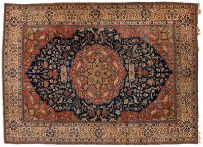 Tabriz rug central medallion with brick red and cobalt fields