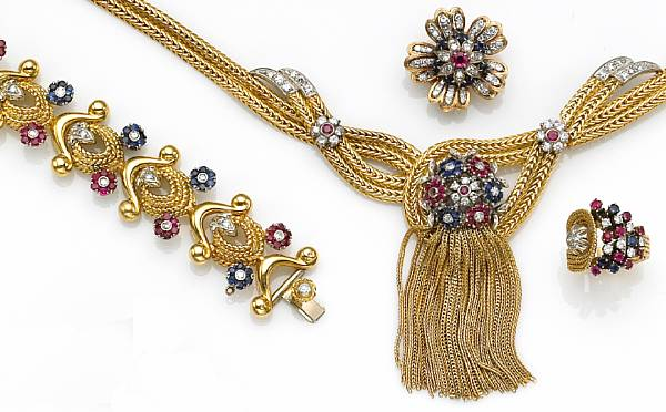 comprising a necklace featuring two detachable central ornaments one designed