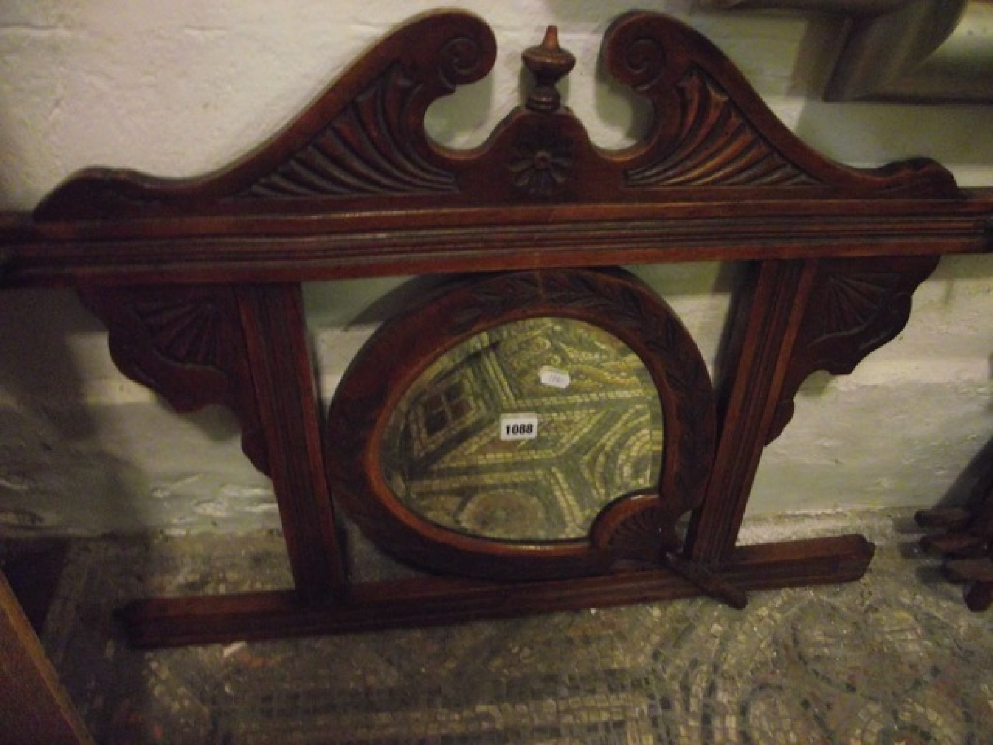 An unusual late Victorian oak hall mirror the moulded rectangular
