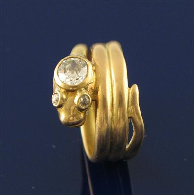 A late Victorian 18ct gold snake ring the head set