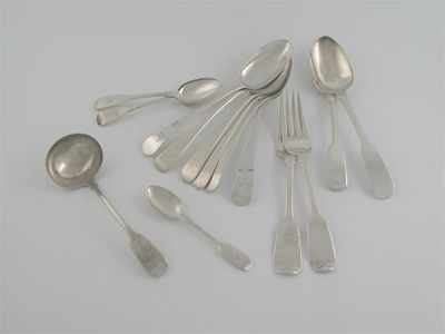 A quantity of George III Victorian flatware eighteen teaspoons a