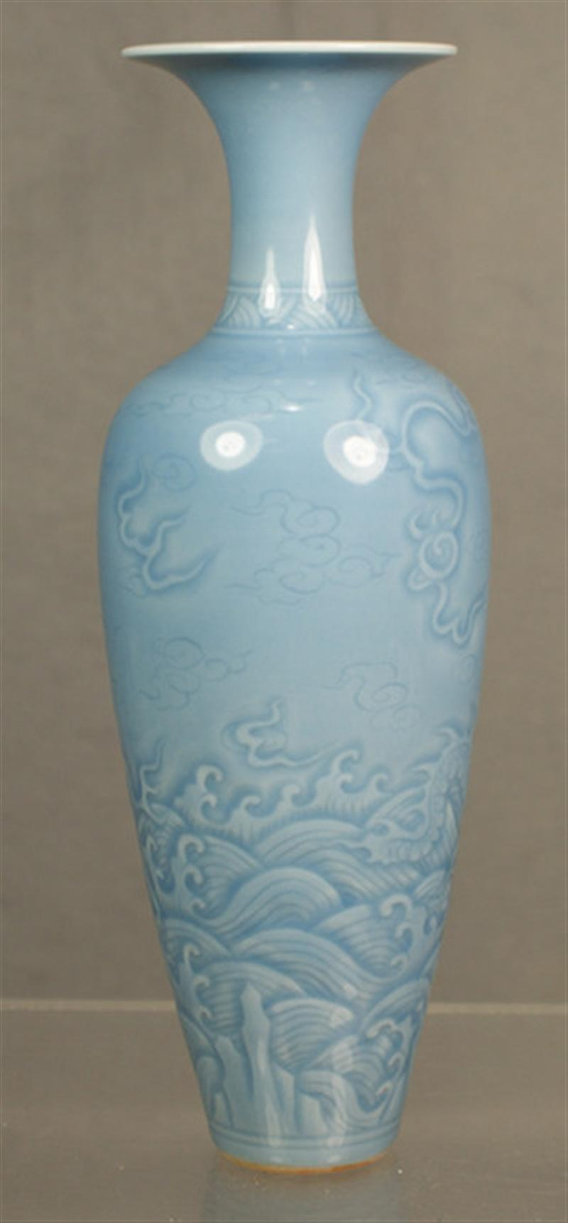 20th c Chinese porcelain vase with dragon design on a