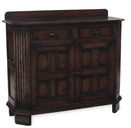 A Jacobean style oak side cabinet the moulded top with