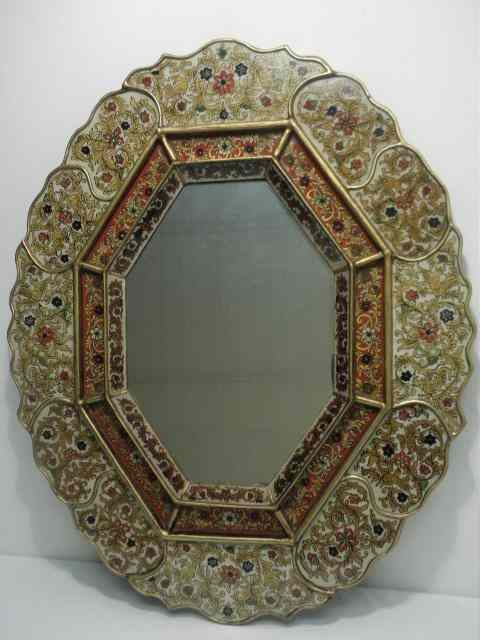 Peruvian reverse painted wall mirror Gilt edges with floral eglomise