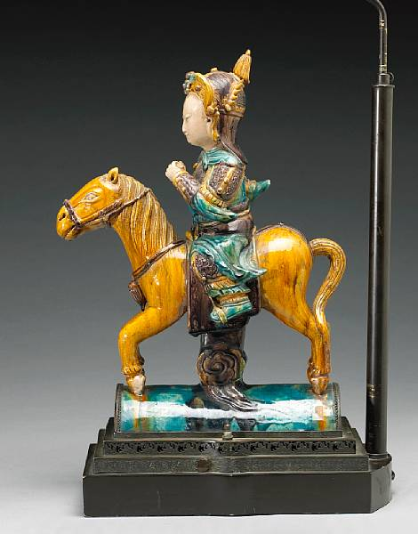 A Ming style glazed roof tile in the form of