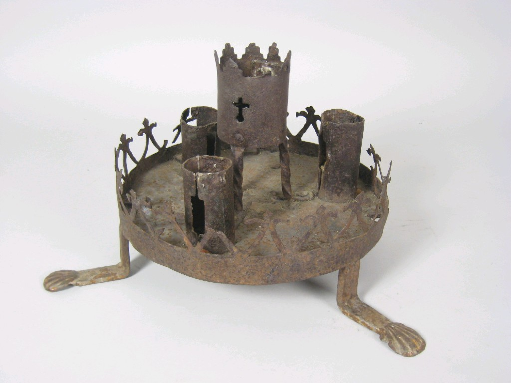 A 17th 18th Century iron multi sconce Candlestick of circular