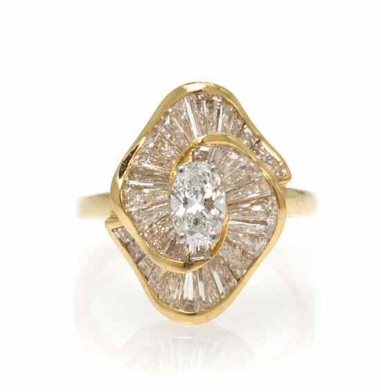 An 18 Karat Yellow Gold and Diamond Ballerina Ring Oscar