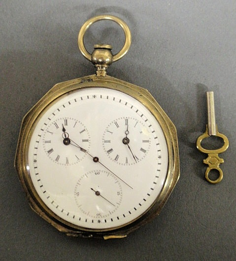 Metal octagonal cased pocket watch the back engraved Robert Haskell