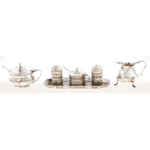 A George V silver condiment set and tray blue glass